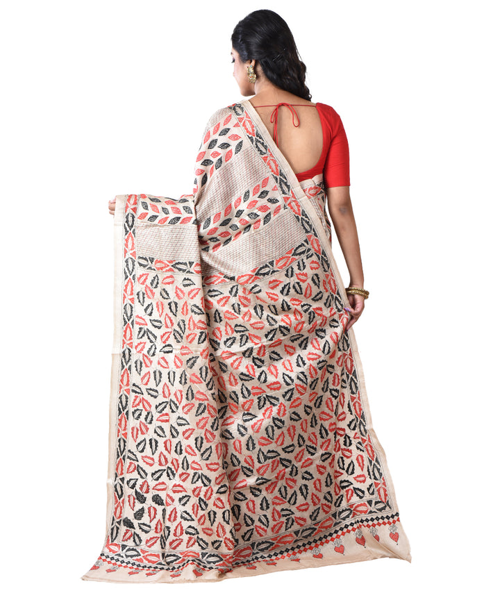 Beige floral hand kantha stitched tussar silk saree