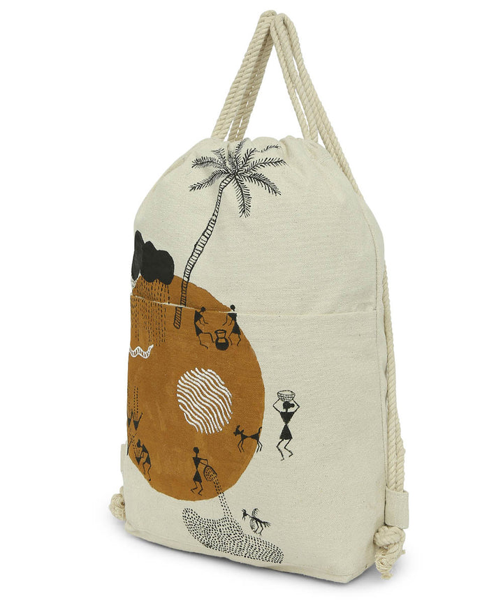 Beige yellow cotton hand painted warli sack bag