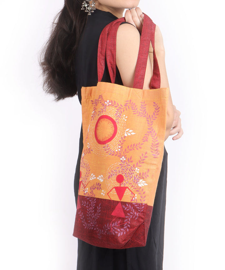 Maroon orange cotton hand painted warli tote bags