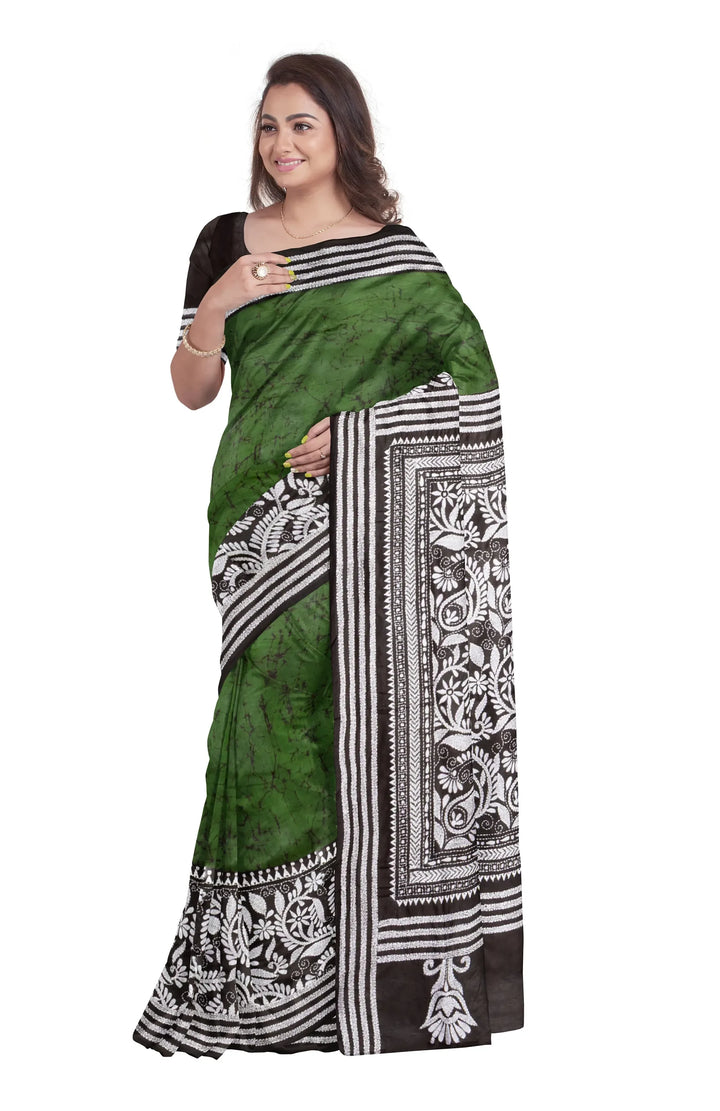 Dark green white handwoven batik print silk saree