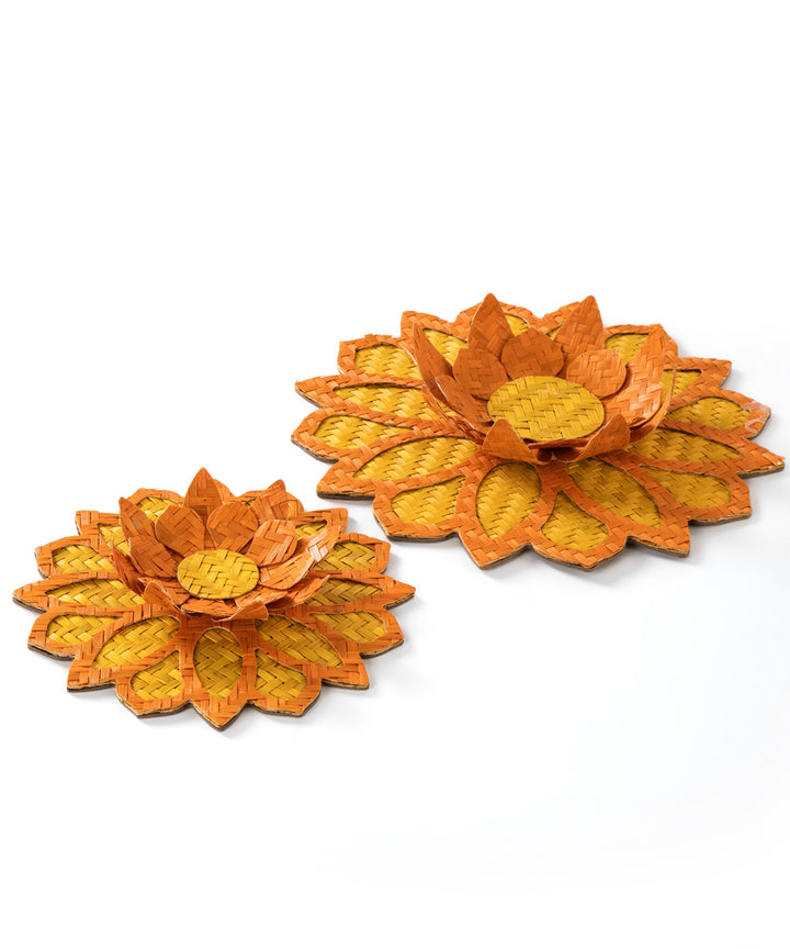 Yellow handcrafted bamboo rangoli with lotus tea light holder