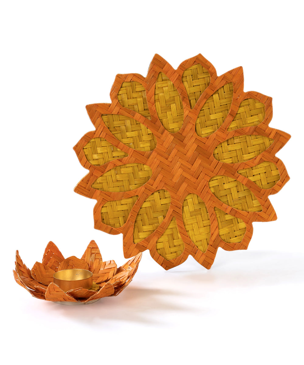 Yellow handcrafted bamboo rangoli with lotus tea light holder