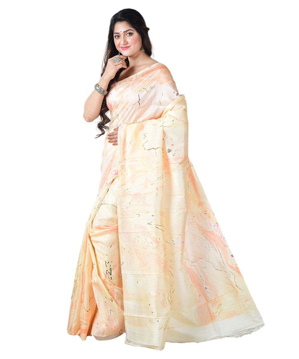 Cream orange batik print handprinted silk saree