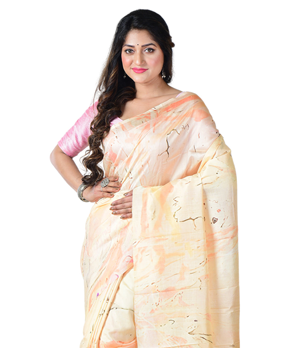 Cream orange batik print handprinted silk saree