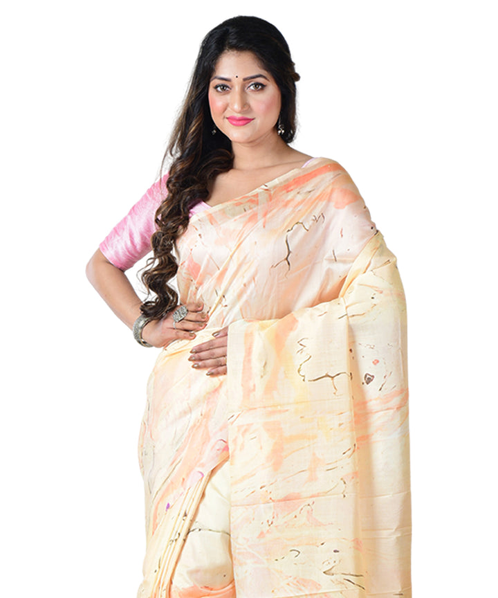 Cream orange batik print handprinted silk saree