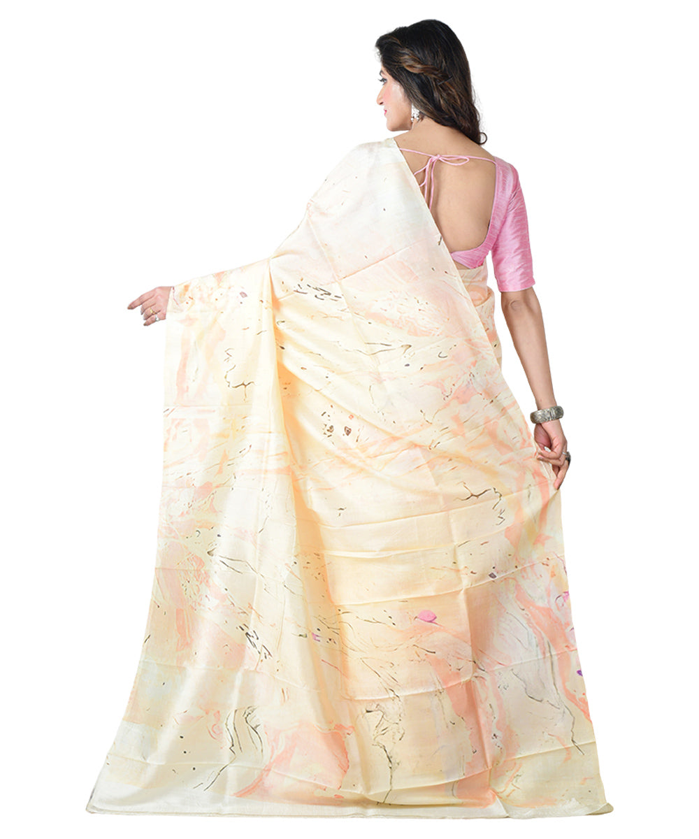 Cream orange batik print handprinted silk saree
