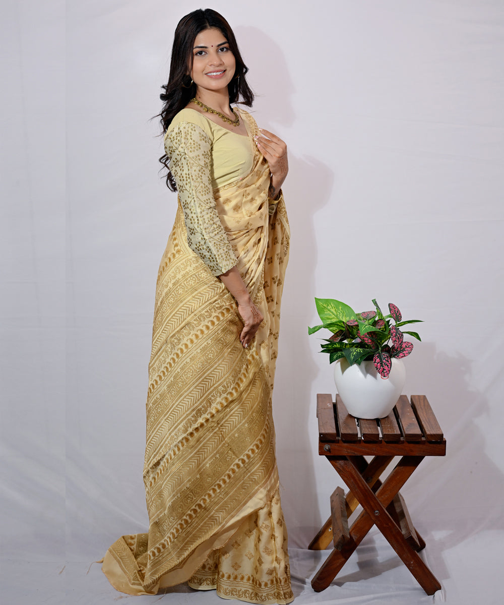 Cream golden yellow hand-block printed modal silk saree