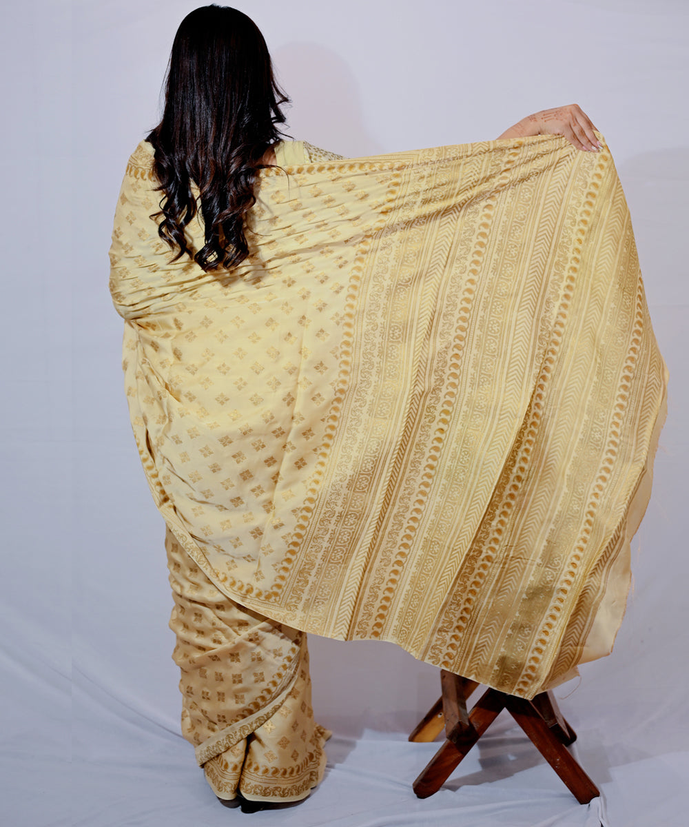 Cream golden yellow hand-block printed modal silk saree