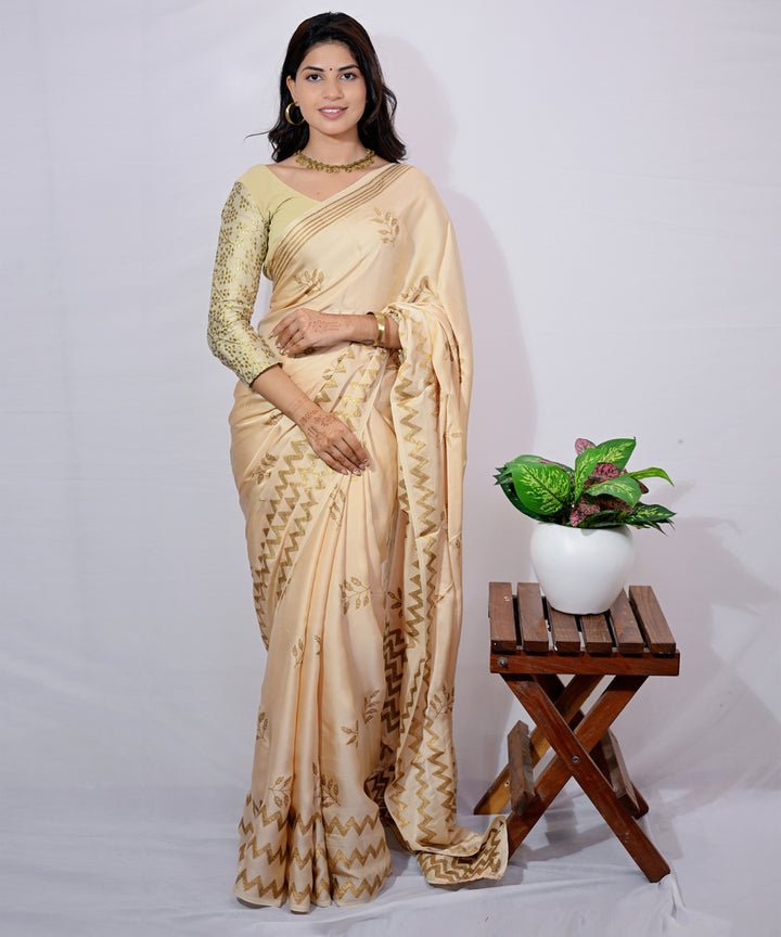 Cream golden yellow hand block printed modal silk saree