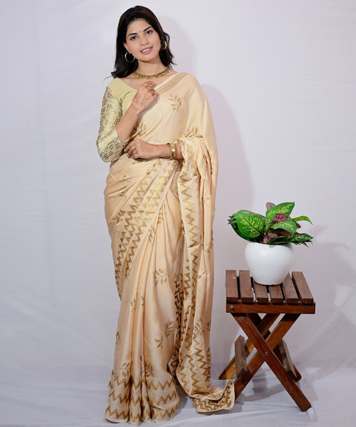 Cream golden yellow hand block printed modal silk saree
