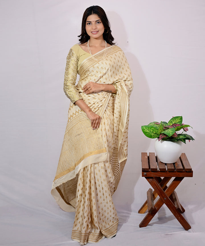 Cream golden yellow modal silk hand block printed saree