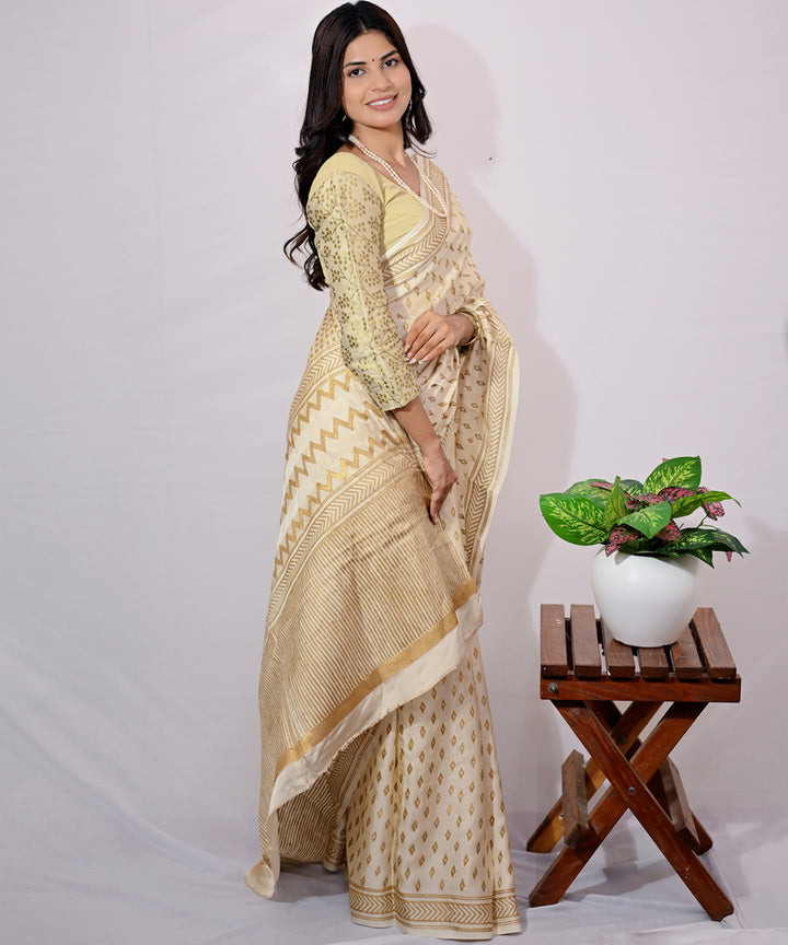 Cream golden yellow modal silk hand block printed saree