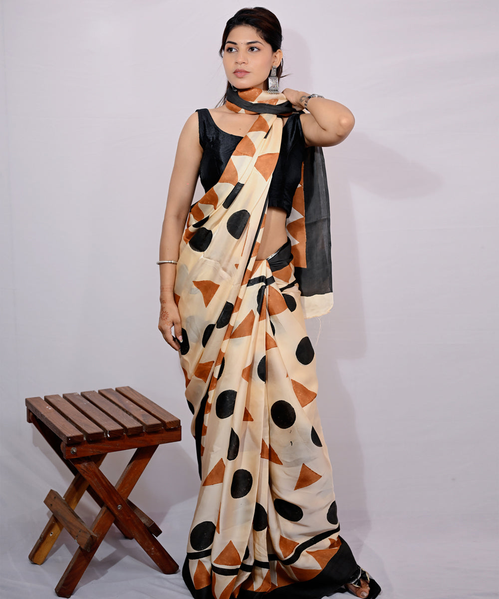 Cream black modal silk hand block printed saree