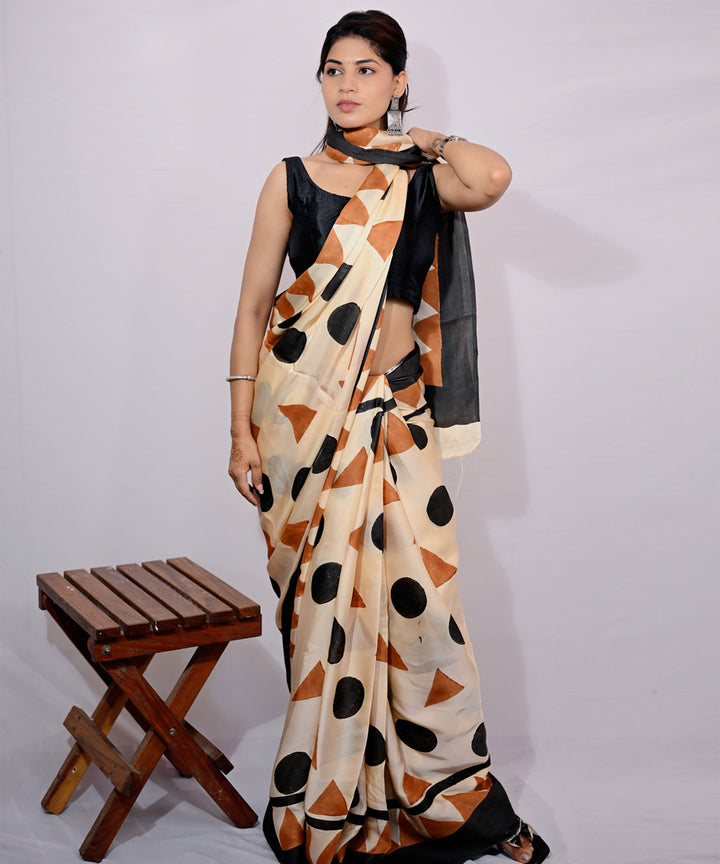 Cream black modal silk hand block printed saree