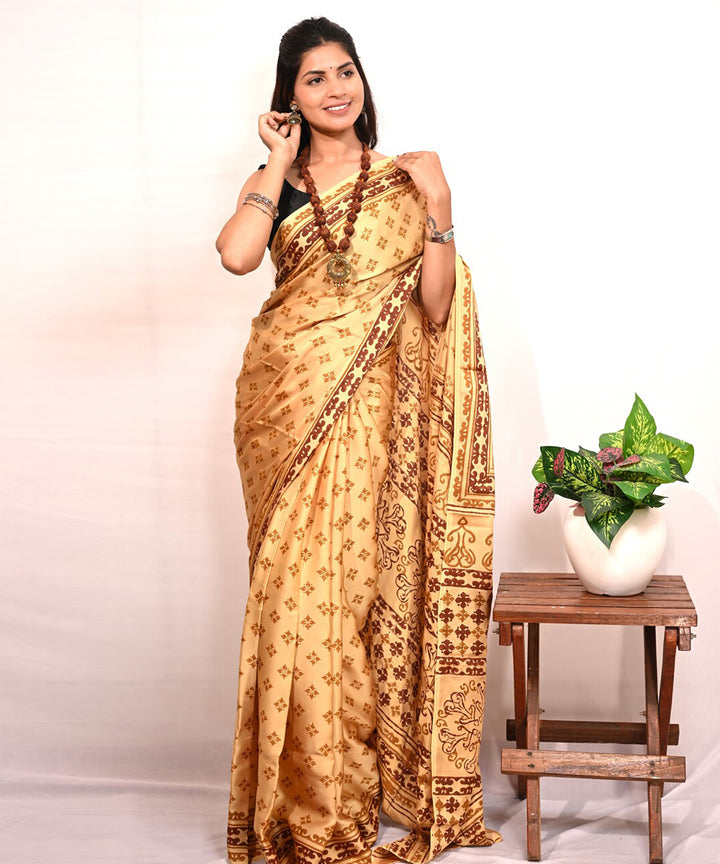 Yellow maroon modal silk hand block printed saree
