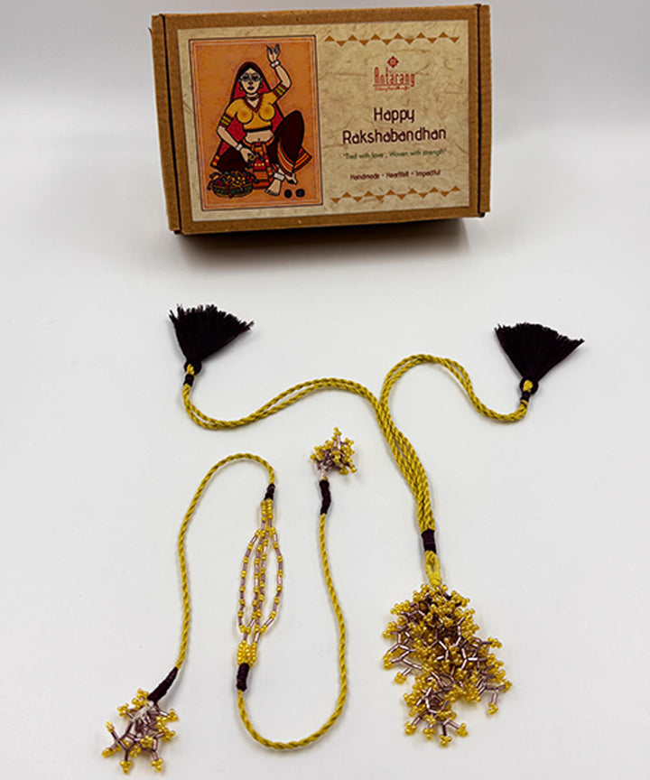 Yellow lemon maroon handmade bead work beads anchor threads rakhi