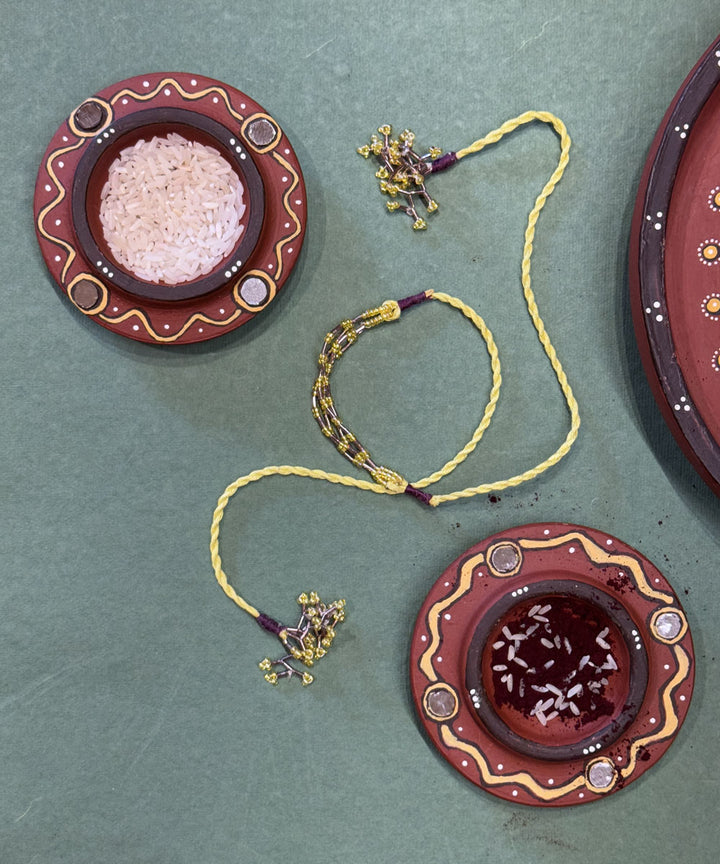Yellow lemon maroon handmade bead work beads anchor threads rakhi