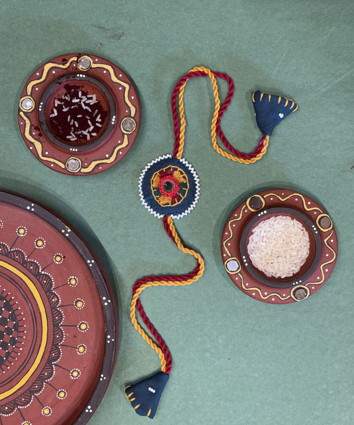 Yellow dark blue bead work beads fabric mirror anchor threads rakhi