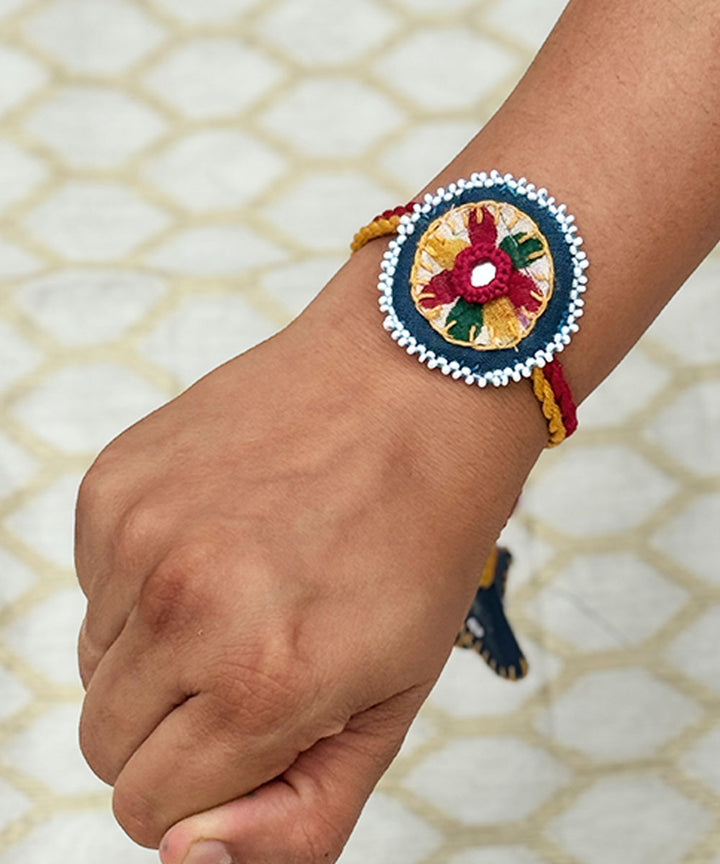 Yellow dark blue bead work beads fabric mirror anchor threads rakhi