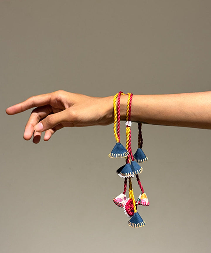 Red yellow blue handmade bead work fabric mirror anchor threads rakhi