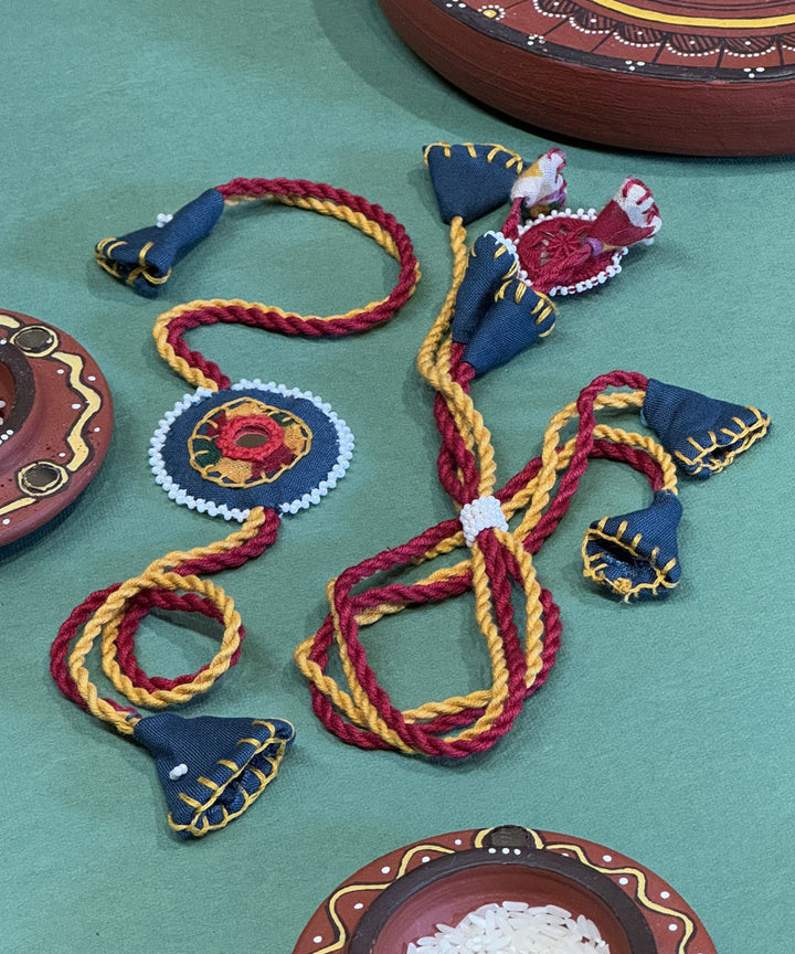 Red yellow blue handmade bead work fabric mirror anchor threads rakhi