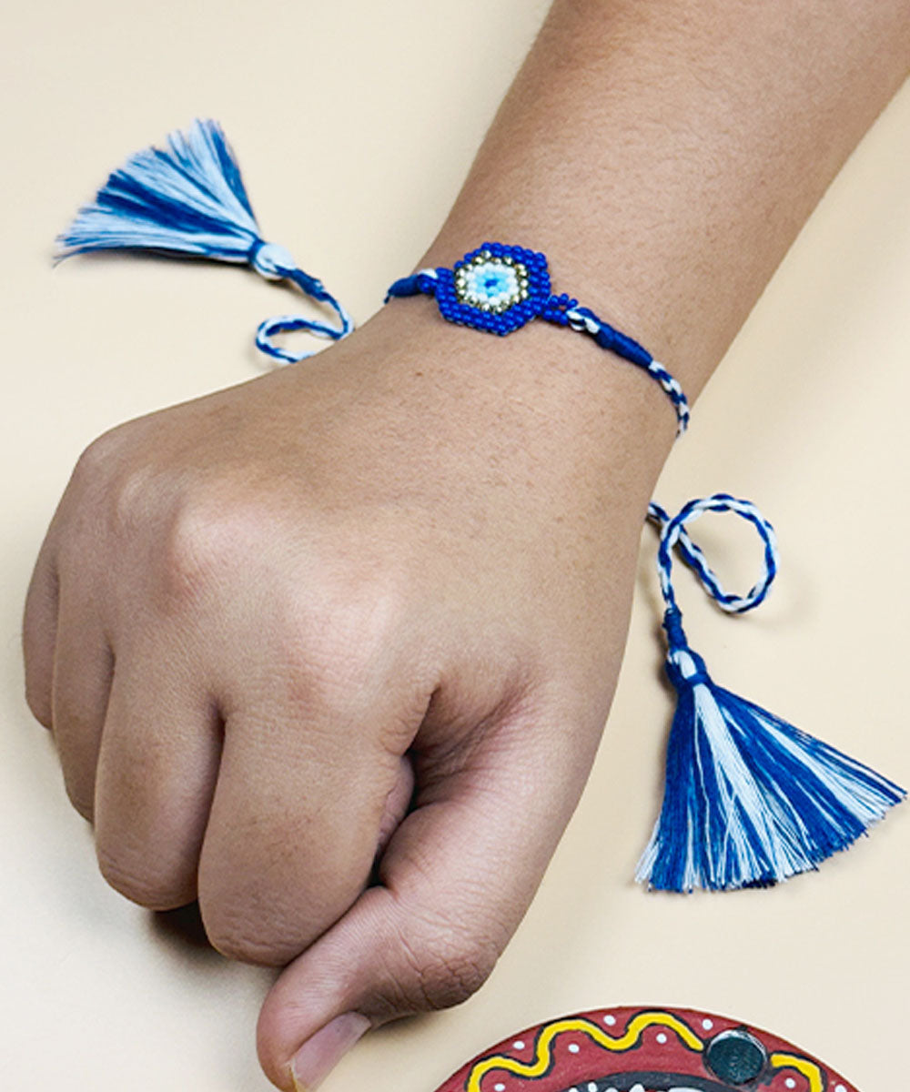 Navy blue white handmade bead work glass beads rakhi