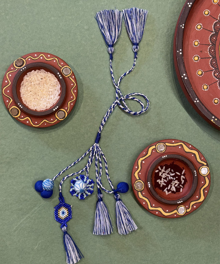 Light blue white bead work beads fabric handmade anchor threads rakhi