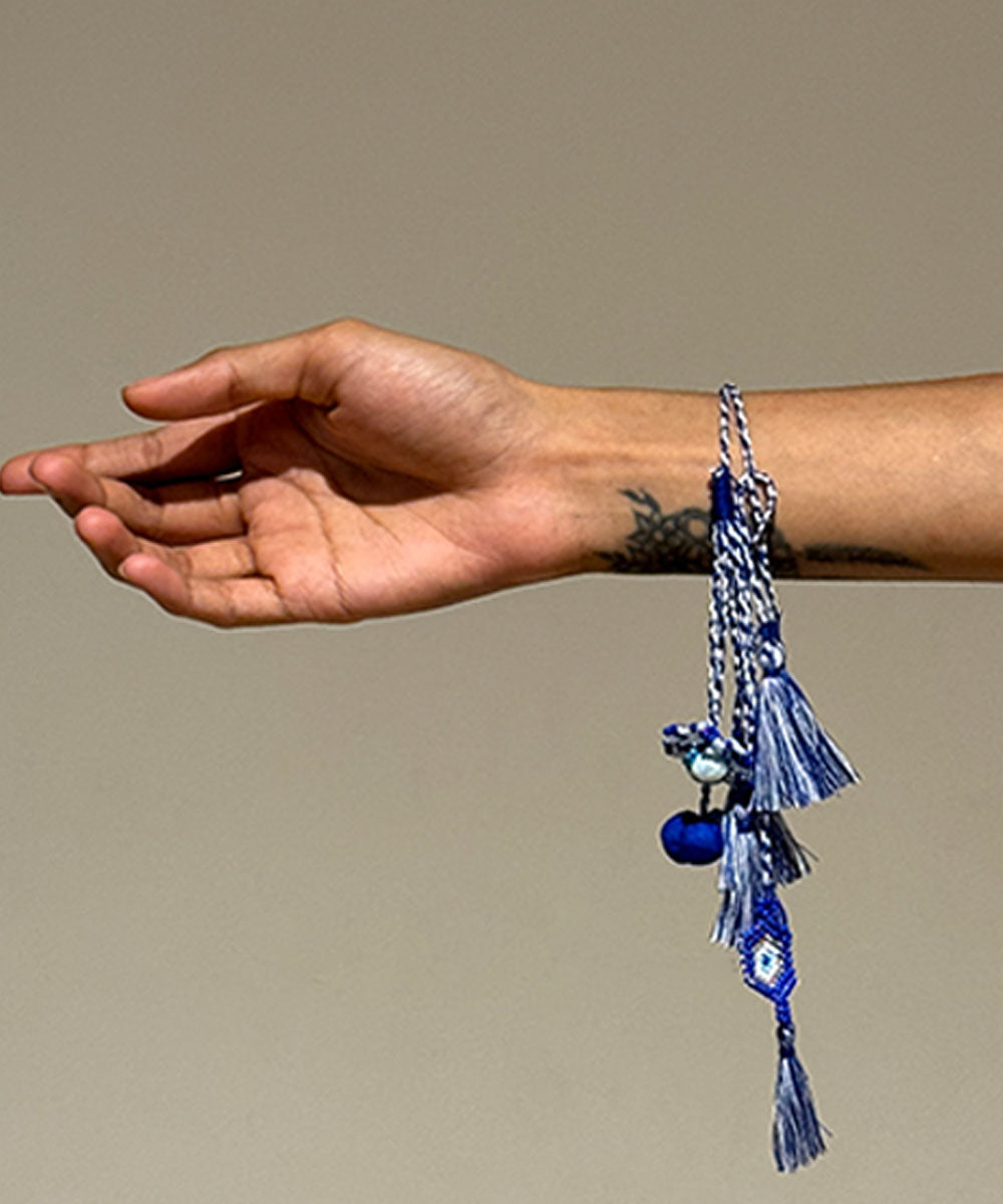 Handmade light blue white bead work beads fabric anchor threads rakhi