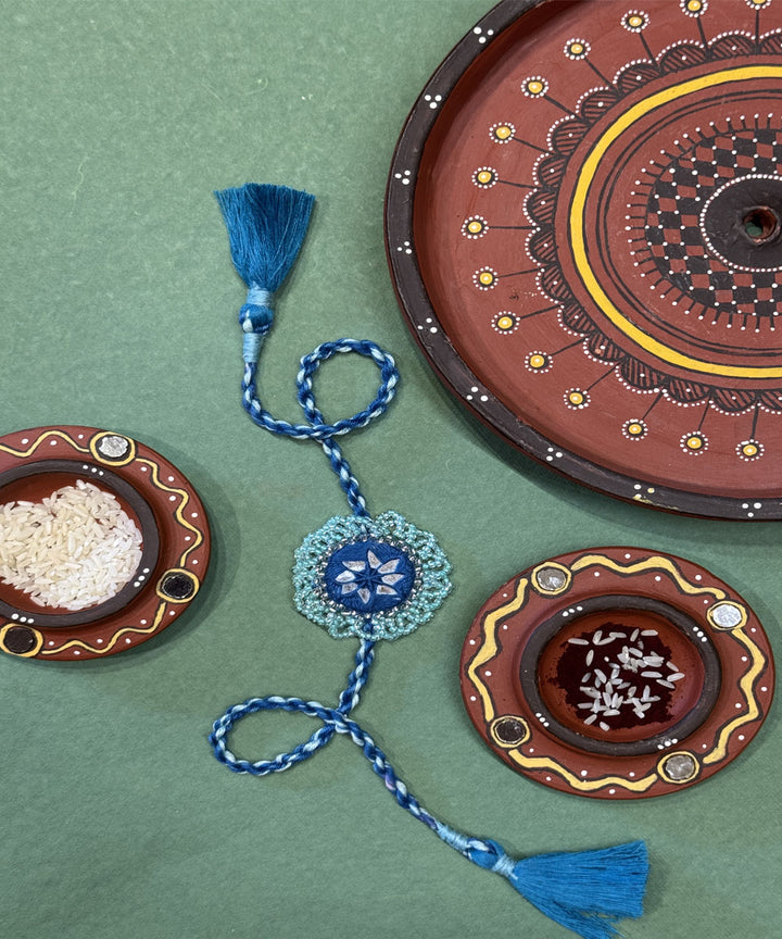 Shades of blue handmade bead work beads mirror anchor threads rakhi