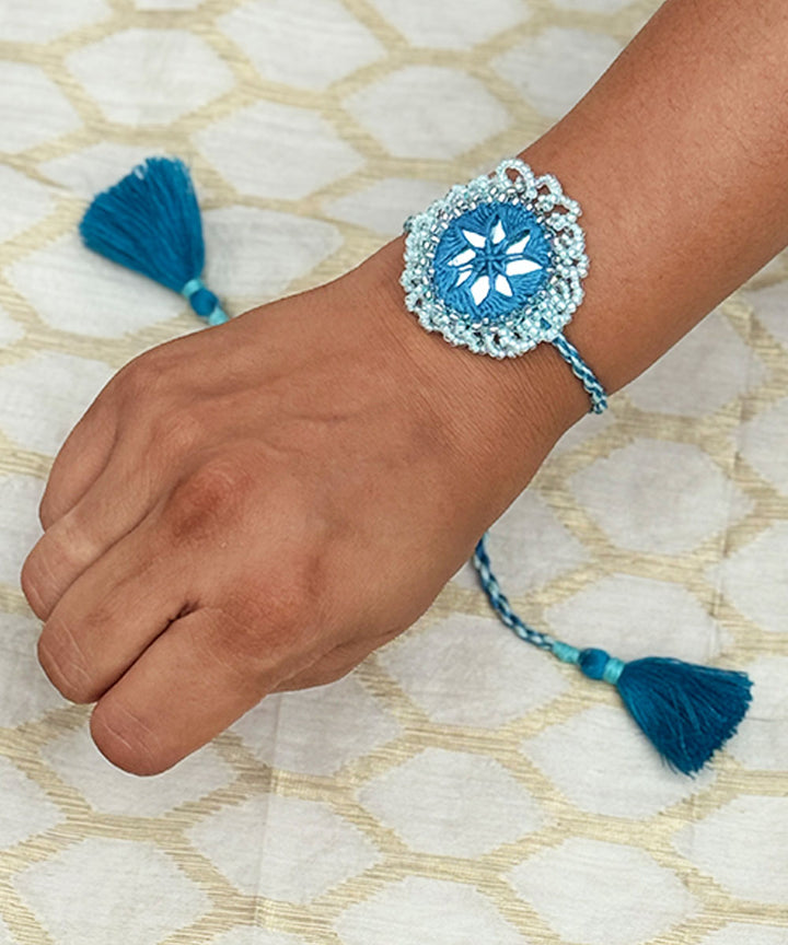 Shades of blue handmade bead work beads mirror anchor threads rakhi