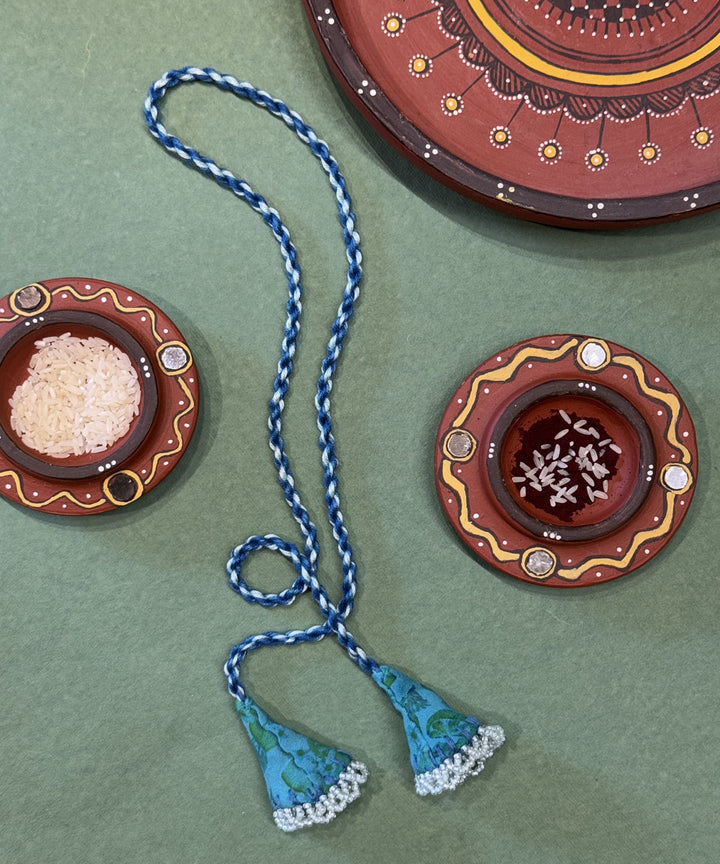 Shades of blue handmade bead work beads fabric anchor threads rakhi