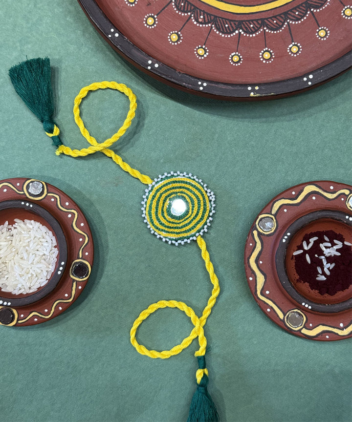 Yellow green handmade bead work mirror fabric anchor threads rakhi
