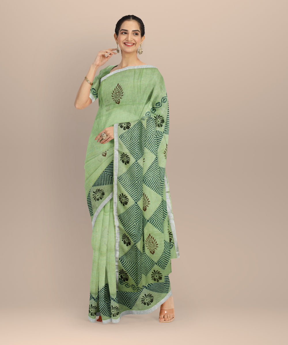 Light green multicolor linen hand printed  saree