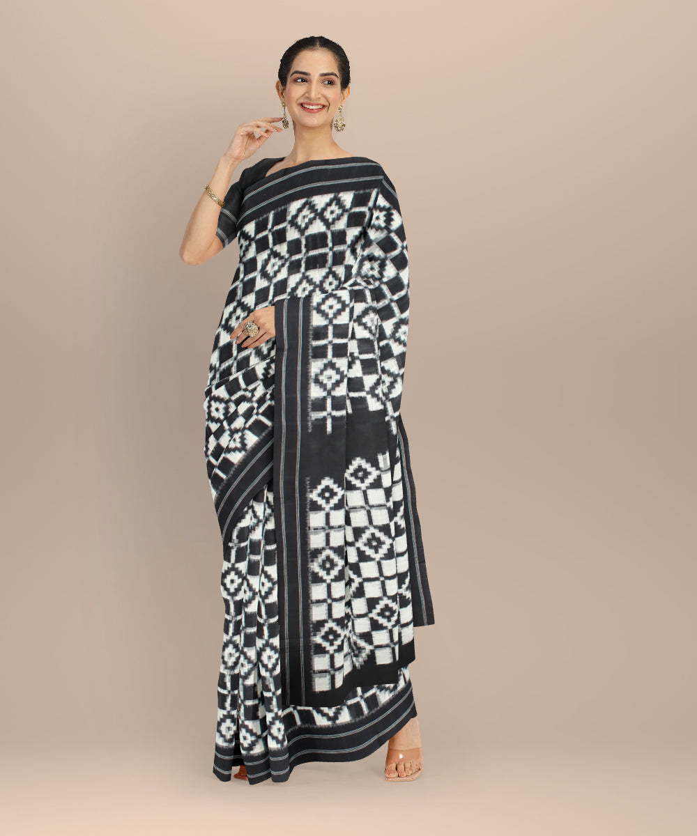 White black teliarumal cotton handloom pochampally ikat saree