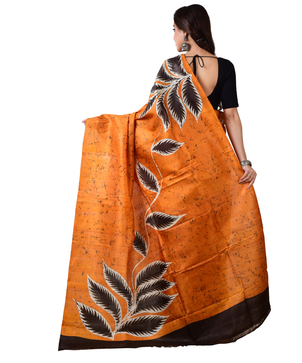 Orange black silk hand batik printed saree