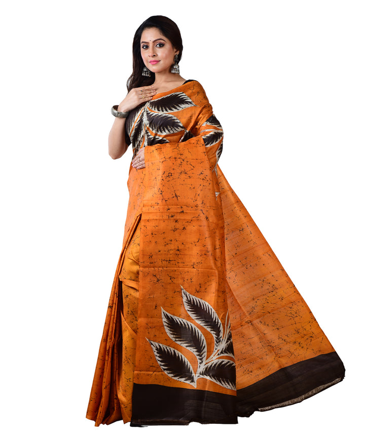 Orange black silk hand batik printed saree