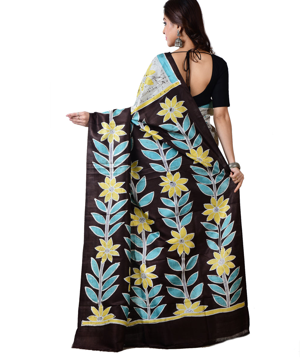 Sky blue black silk hand batik printed saree