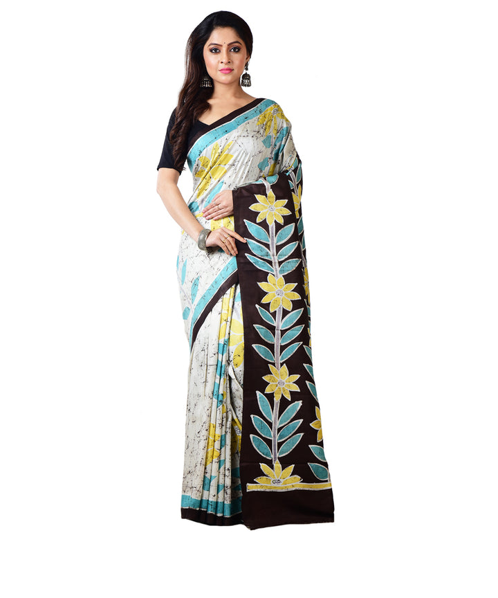 Sky blue black silk hand batik printed saree