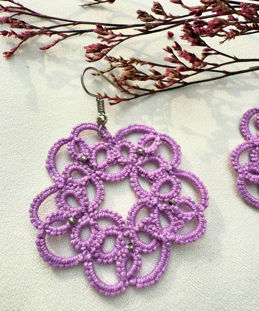 Purple handcrafted tatting fabric and metal earring