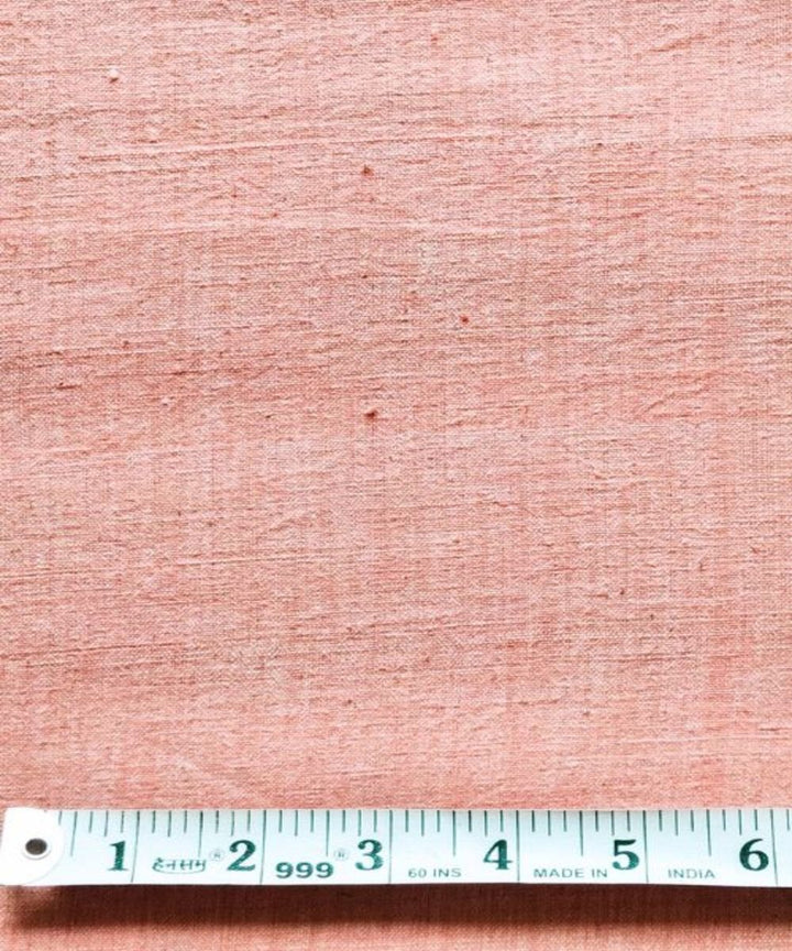 Peach yarn dyed kala cotton handwoven fabric
