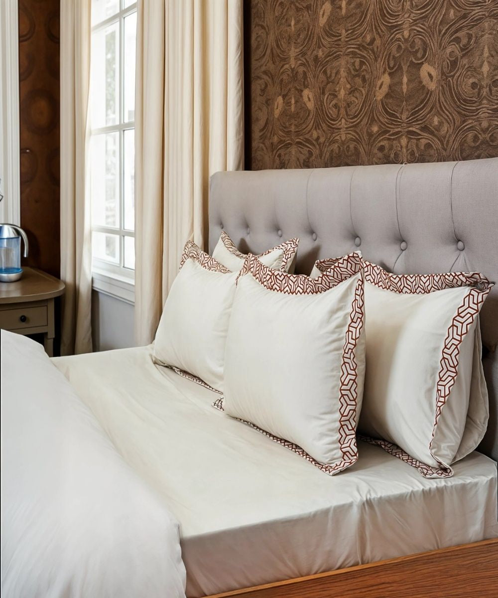 Off white cotton hand embroidered bedsheet