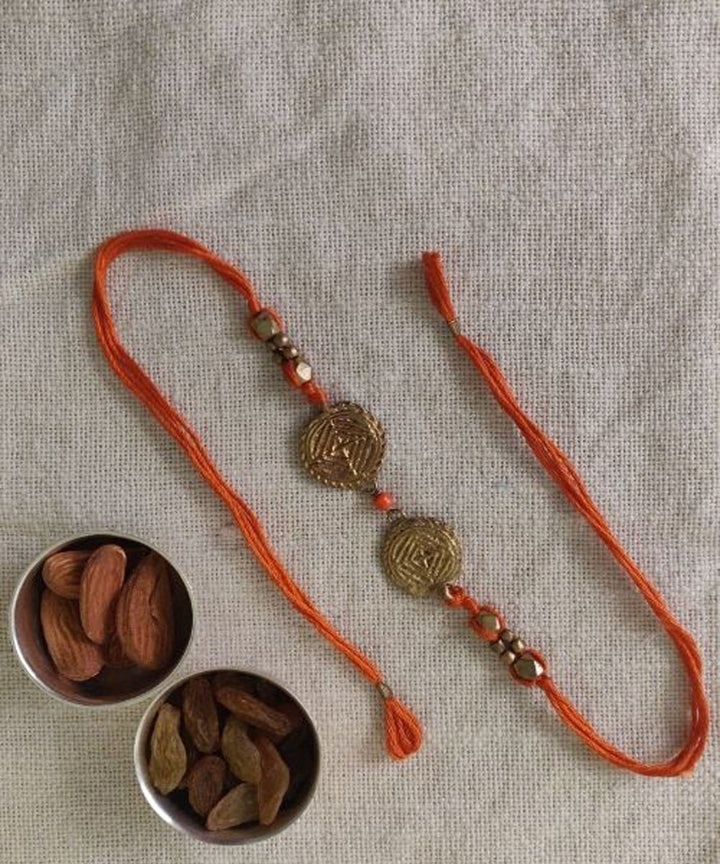 Orange thread handmade rakhi