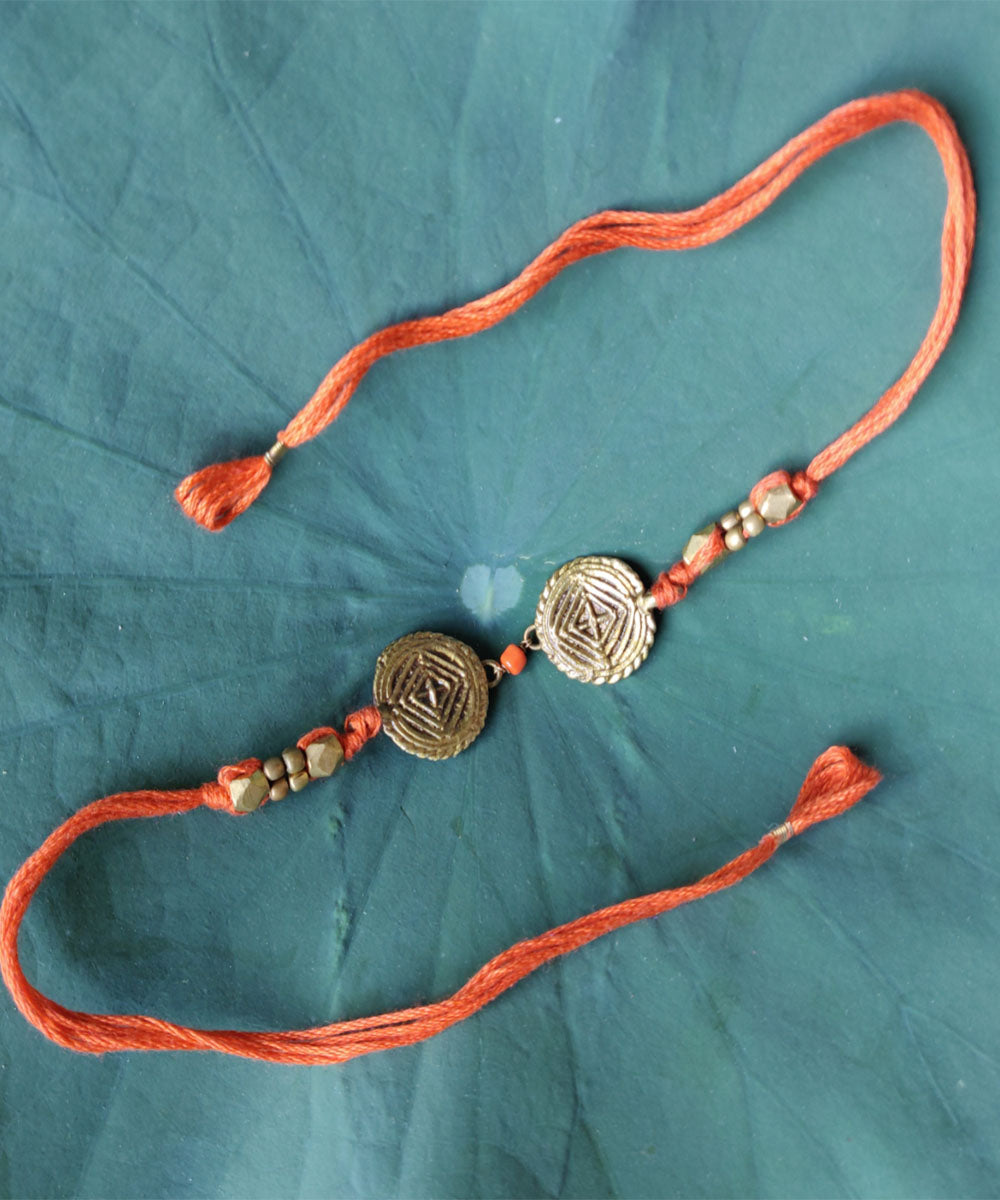 Orange thread handmade rakhi