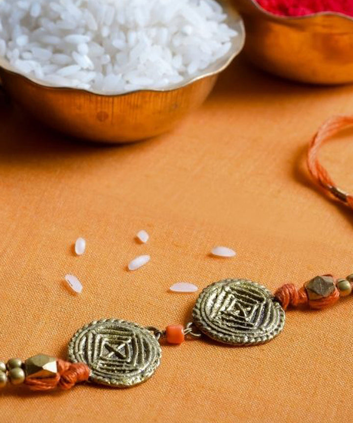 Orange thread handmade rakhi