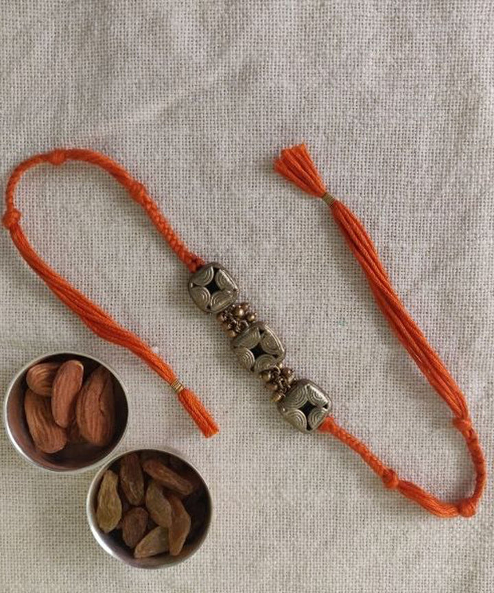 Orange handcrafted thread rakhi