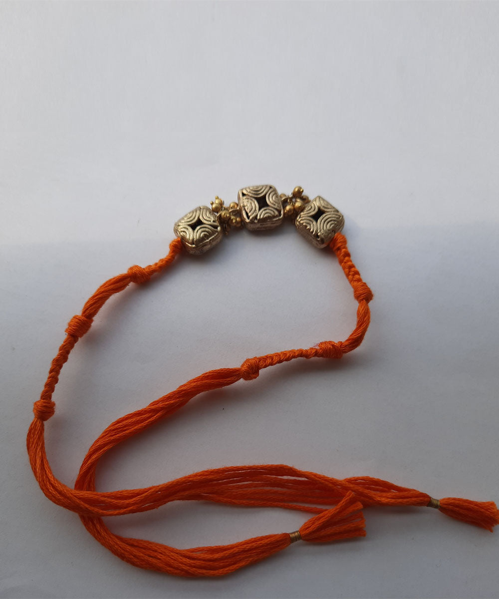 Orange handcrafted thread rakhi