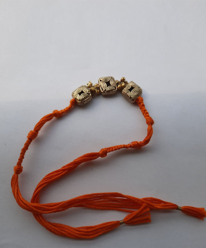 Orange handcrafted thread rakhi