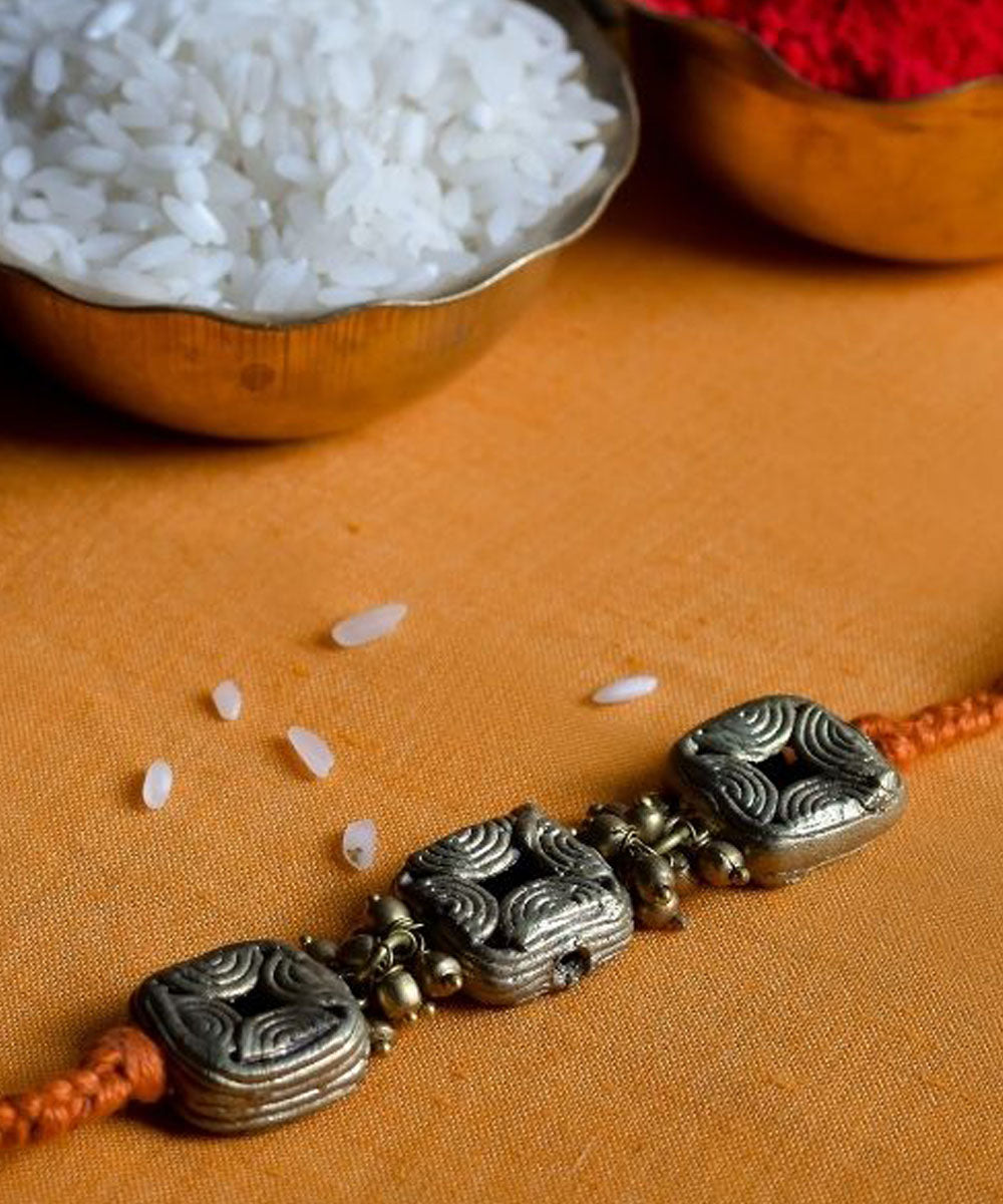 Orange handcrafted thread rakhi