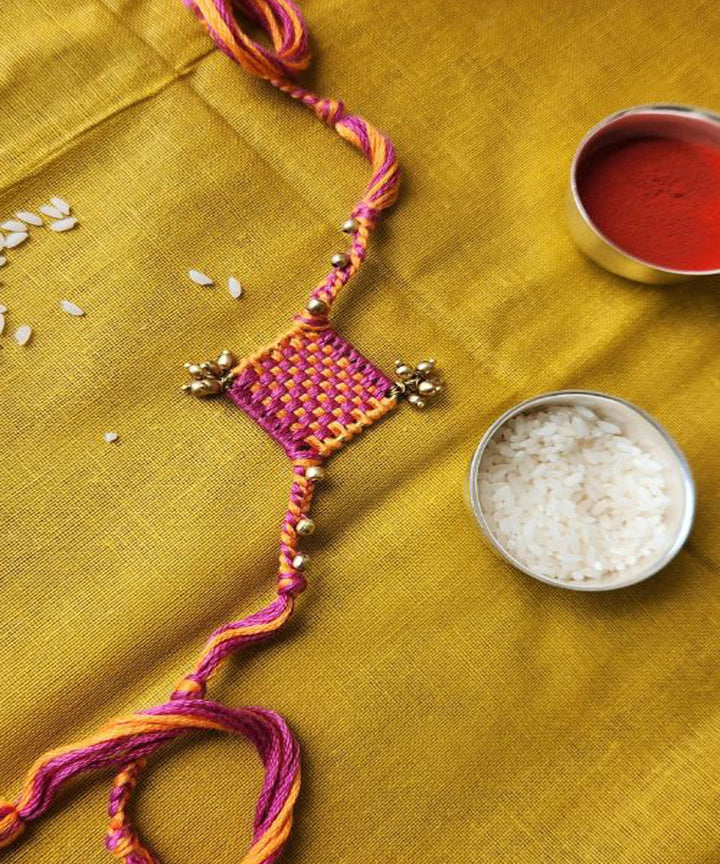 Red orange handmade thread rakhi