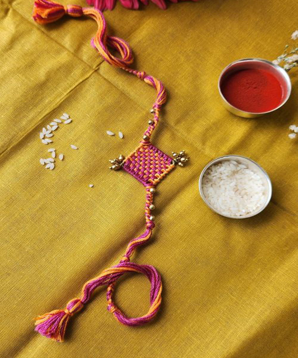 Red orange handmade thread rakhi